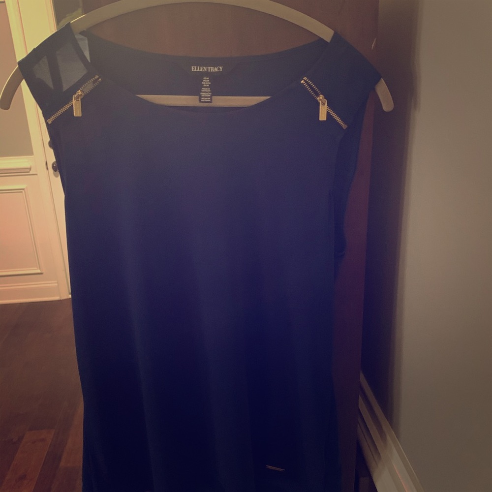 Navy blue tank with gold accents on sleeves